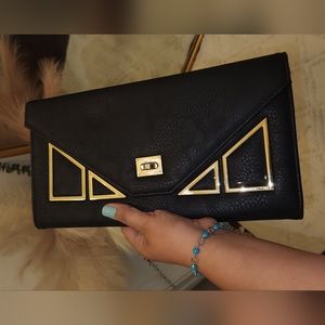 Black envelope clutch